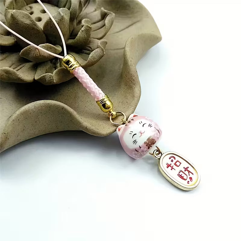 Colgante Maneki-neko de porcelana