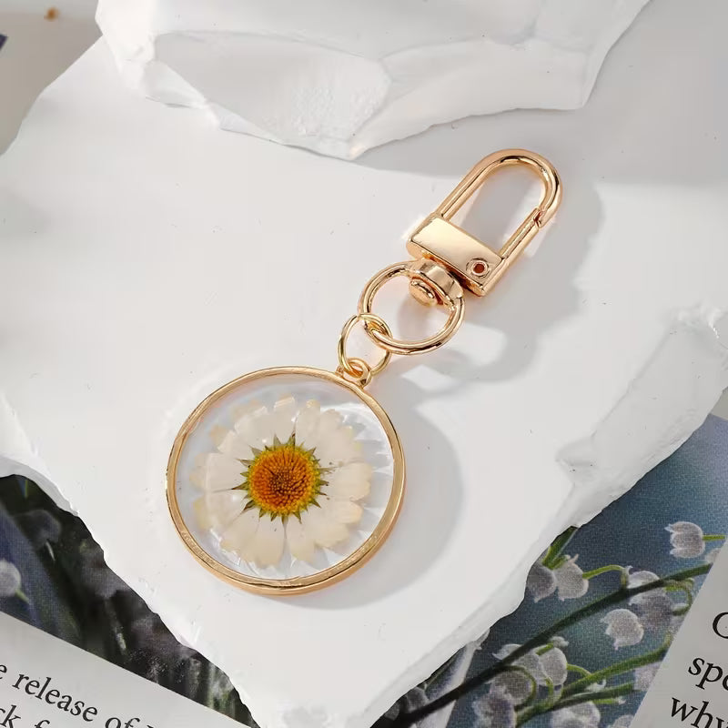 Colgante flor en resina