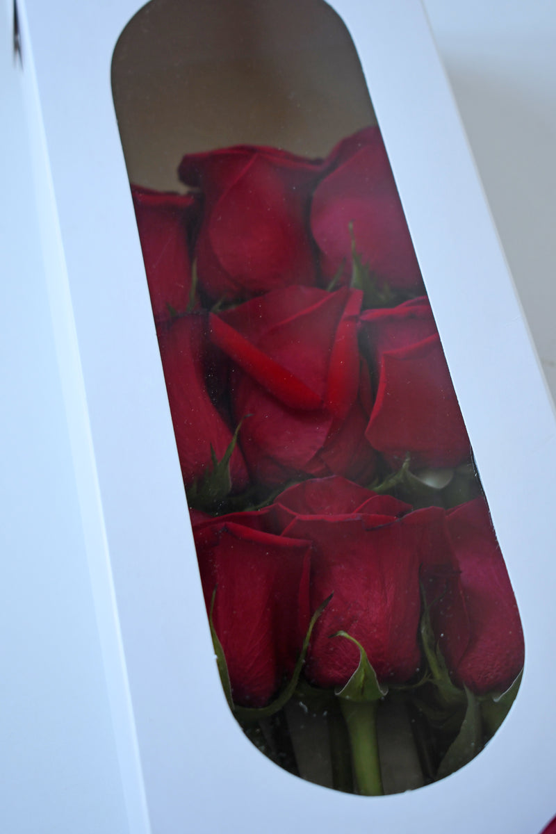 Caja de 9 rosas rojas